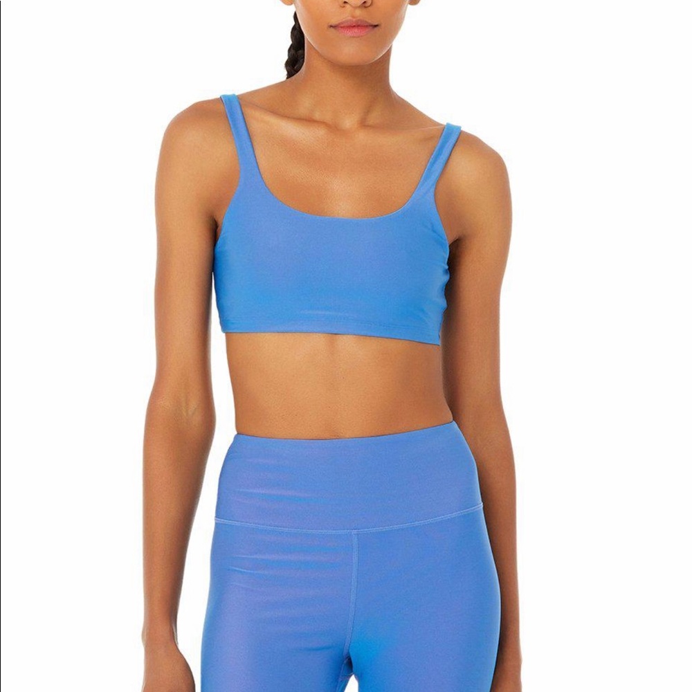 ALO sports bra in iridescent blue/purple. …